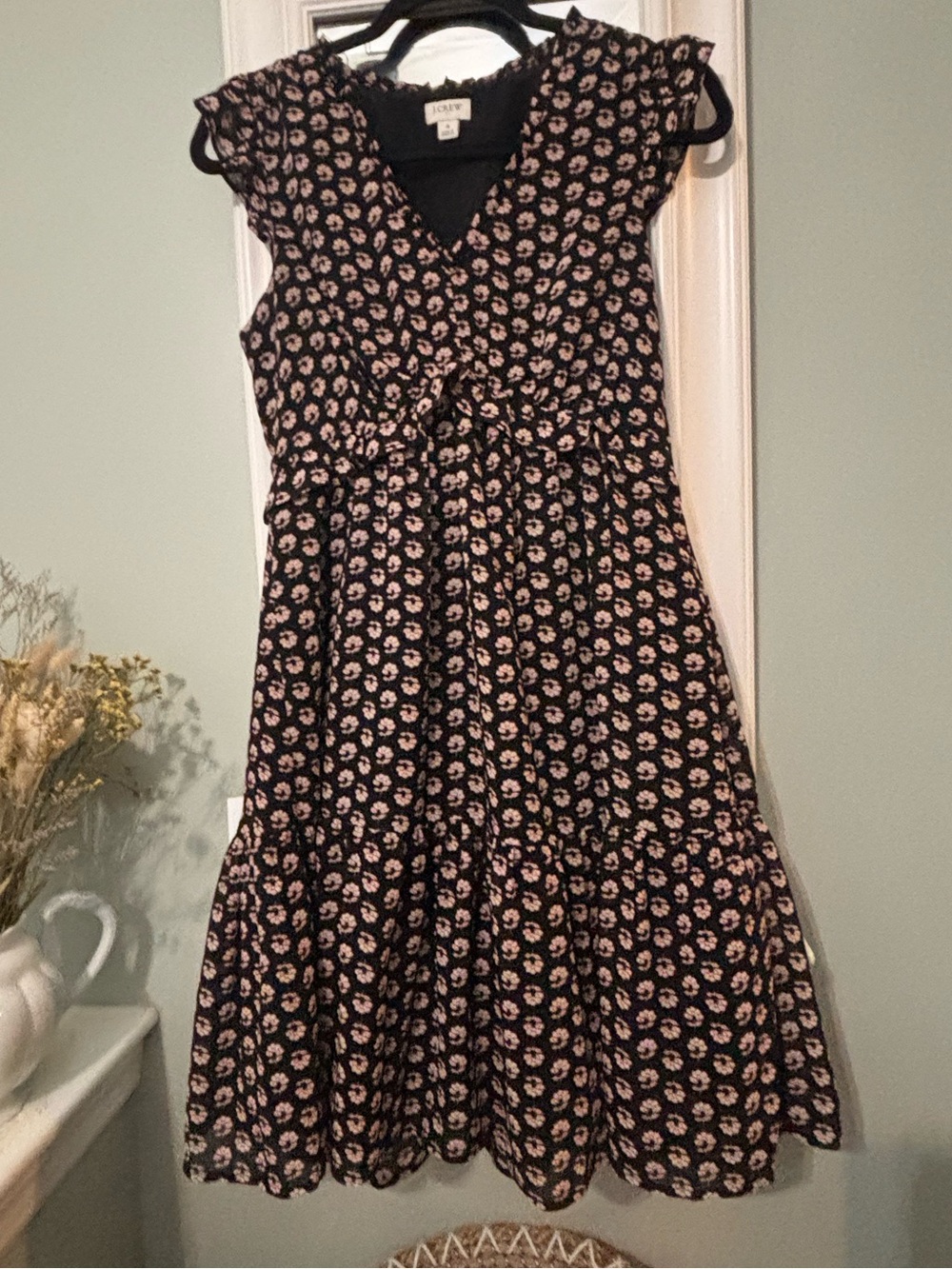 J. Crew black floral print mini dress with ruffled cap sleeves and a V-neckline